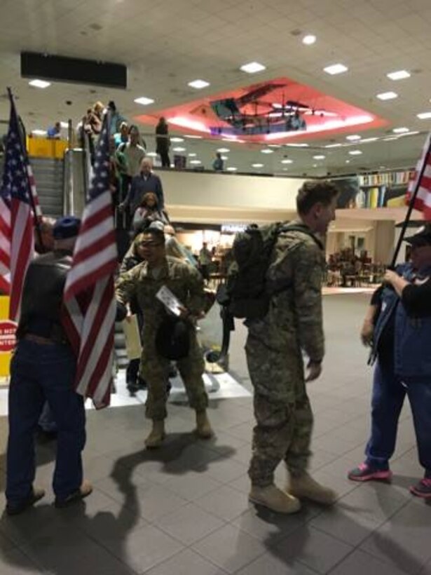 Members of 45th and 55th Aerial Port Squadrons returned from deployment in Southwest Asia supporting Operation Inherent Resolve Nov. 18, 2015. The Airmen were greeted by friends and family at Sacramento International Airport. The Patriot Guard Riders of Northern California were also on hand to welcome the returning warriors. (Courtesy photos by Danielle Eaton)
