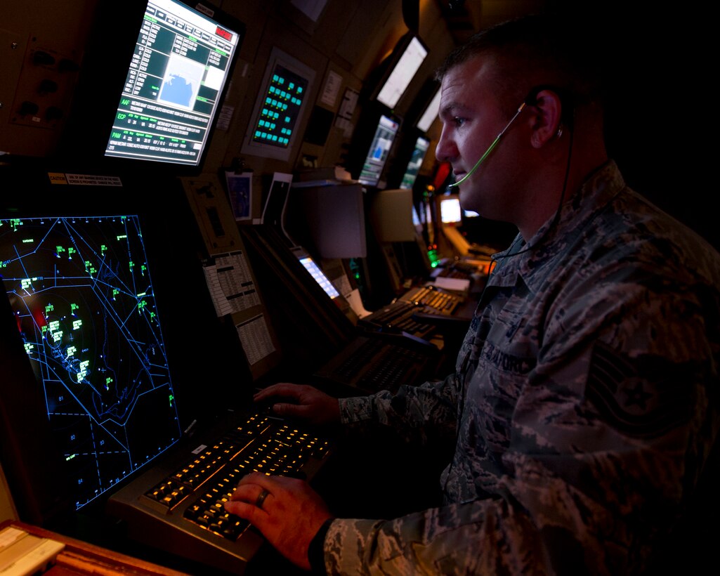 Technical Sgt. Joseph Southern, 325th Operations Support Squadron Air Traffic Control RAPCON watch supervisor, monitors the airspace Nov. 13 in the RAPCON. Members of the RAPCON manage the flow of all aircraft including civilian planes in and around Tyndall’s airspace to ensure no in-air collisions. (U.S. Air Force photo by Senior Airman Alex Fox Echols III/Released)