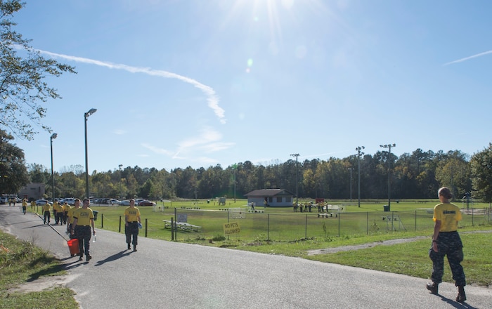 Joint Base Charleston members at the Young Men’s Christian Association in Summerville, S.C., help out during the Day of Caring event on Nov. 13, 2015. The Day of Caring had multiple events in the local tri-county area where JB Charleston members volunteered their time to help weed, rebuild, maintain, fix and repaint.  Additionally, the volunteers restored a local butterfly garden, planted trees, rebuilt fences and much more. (U.S. Air Force photo/Airman 1st Class Thomas T. Charlton)