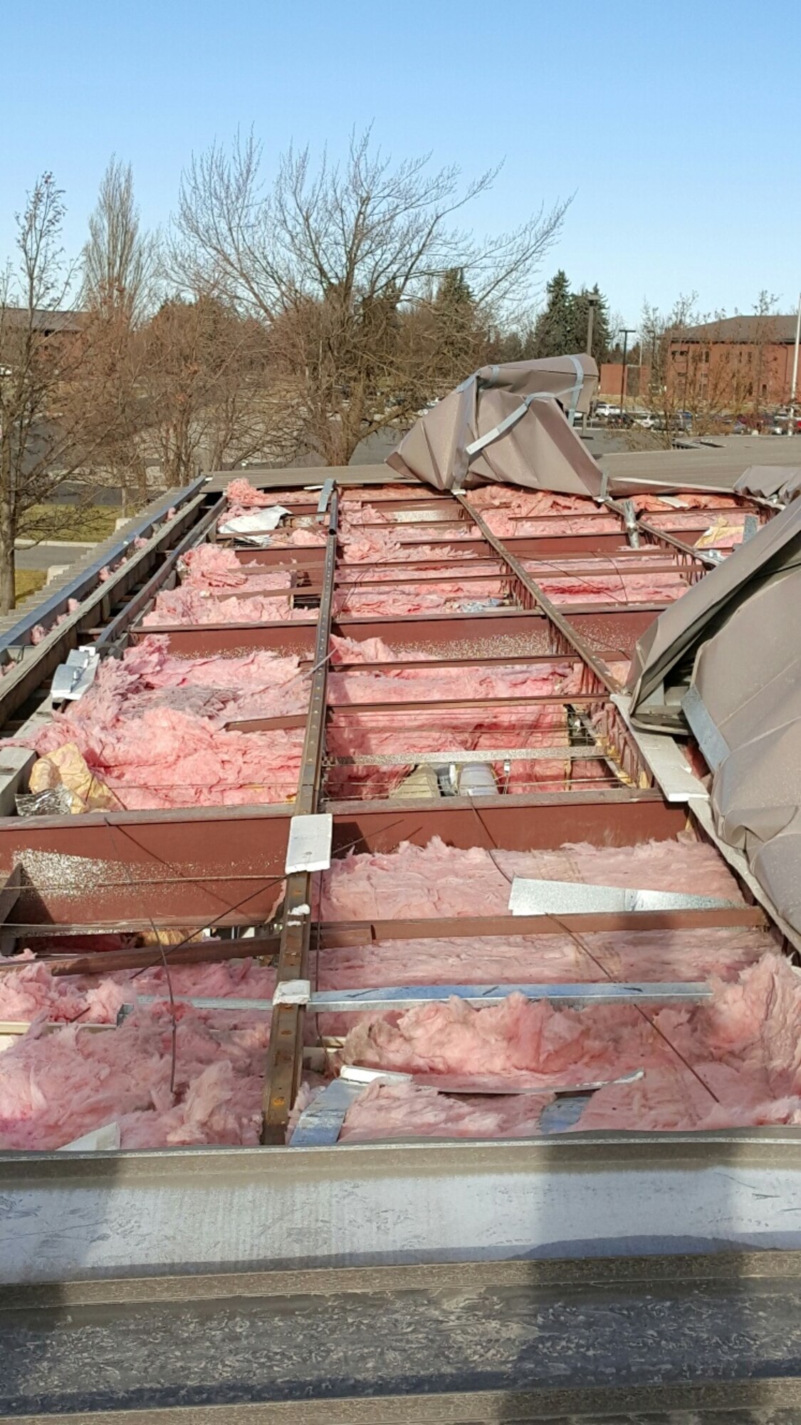 Damage was caused to the 92nd Security Forces Squadron roof from a severe windstorm Nov. 18, 2015 at Fairchild Air Force Base, Wash. The windstorm was the worst storm the area has seen since the ice storm in November 1996. (Courtesy Photo)
