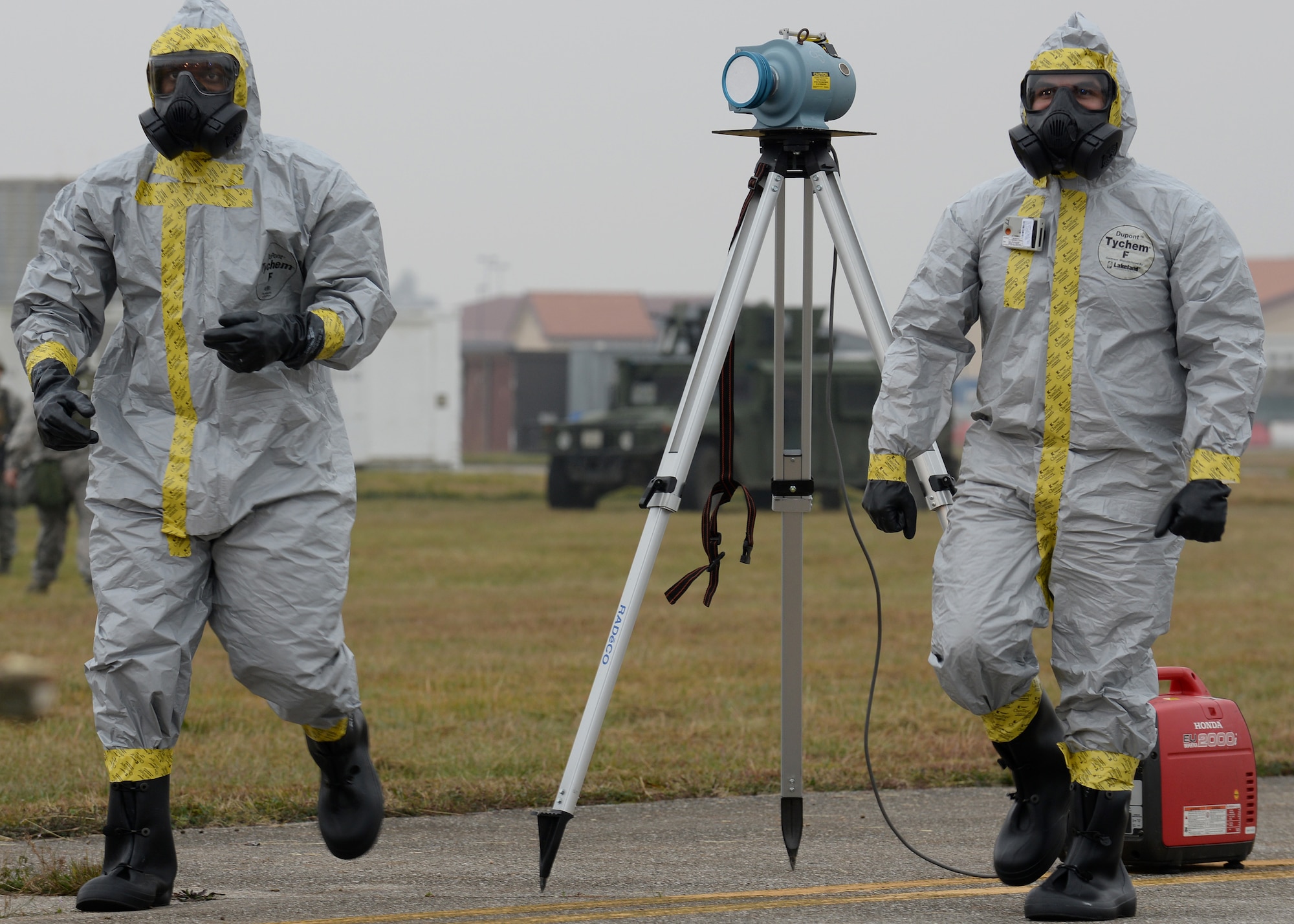 U.S. Air Force Airmen from the 31st Mission Support Group return to a simulated decontamination site during a wing inspection, Nov. 17, 2015, at Aviano Air Base, Italy. The 31st Fighter Wing conducts in several inspections annually designed to identify and rectify deficiencies while highlighting best practices and outstanding performers. (U.S. Air Force photo by Airman 1st Class Cary Smith/Released)