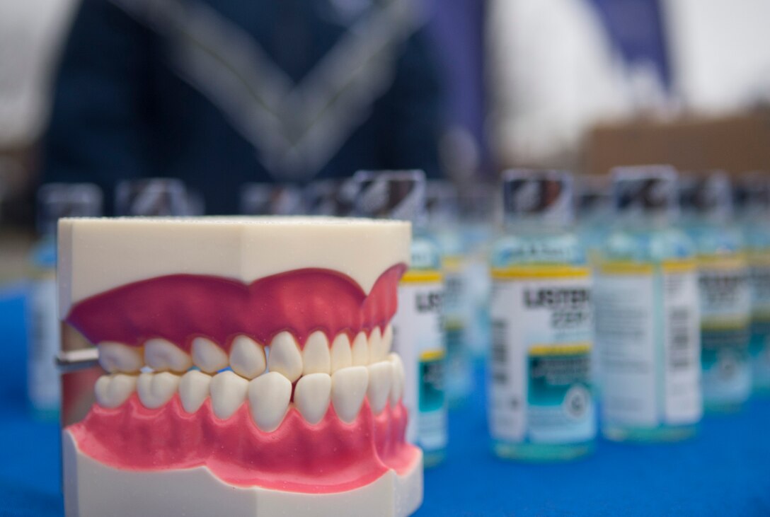 The 779th Dental Squadron displays a booth at the Great American Smokeout 5K Cold Turkey Trot Nov. 19, 2015, on Joint Base Andrews, Md. The event was hosted by 779 Aerospace Medicine Squadron health promotion flight, and is part of a national annual event that encourages smokers to quit. (U.S. Air Force by Senior Airman Mariah Haddenham/Released)