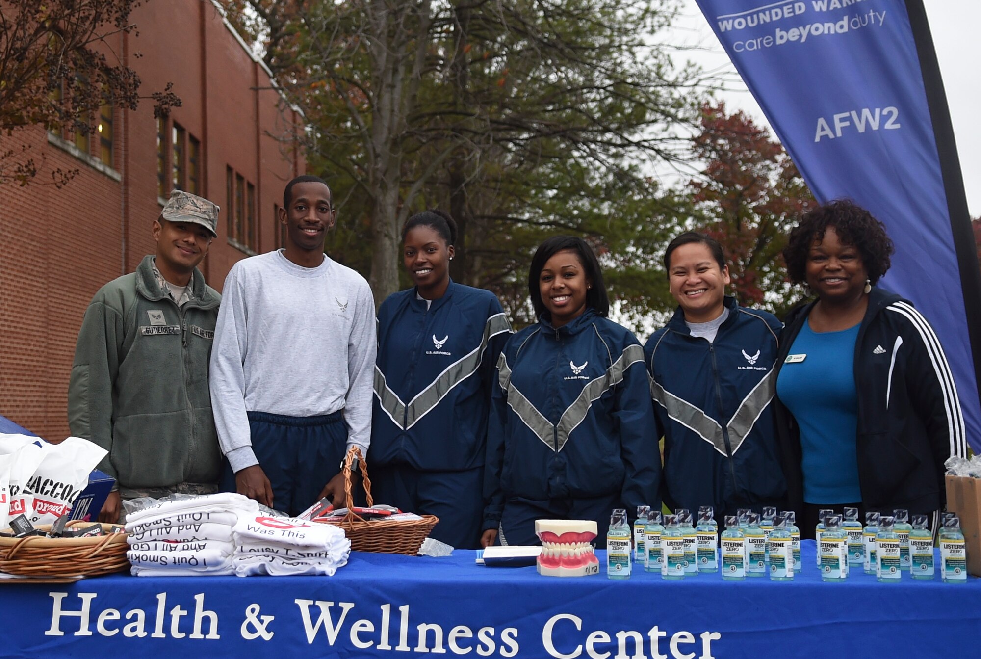 The 779th Dental Squadron smiles for a photo at the Great American Smokeout 5K Cold Turkey Trot Nov. 19, 2015, on Joint Base Andrews, Md. The event was hosted by 779 Aerospace Medicine Squadron health promotion flight, and is part of a national annual event that encourages smokers to quit. (U.S. Air Force by Senior Airman Mariah Haddenham/Released)