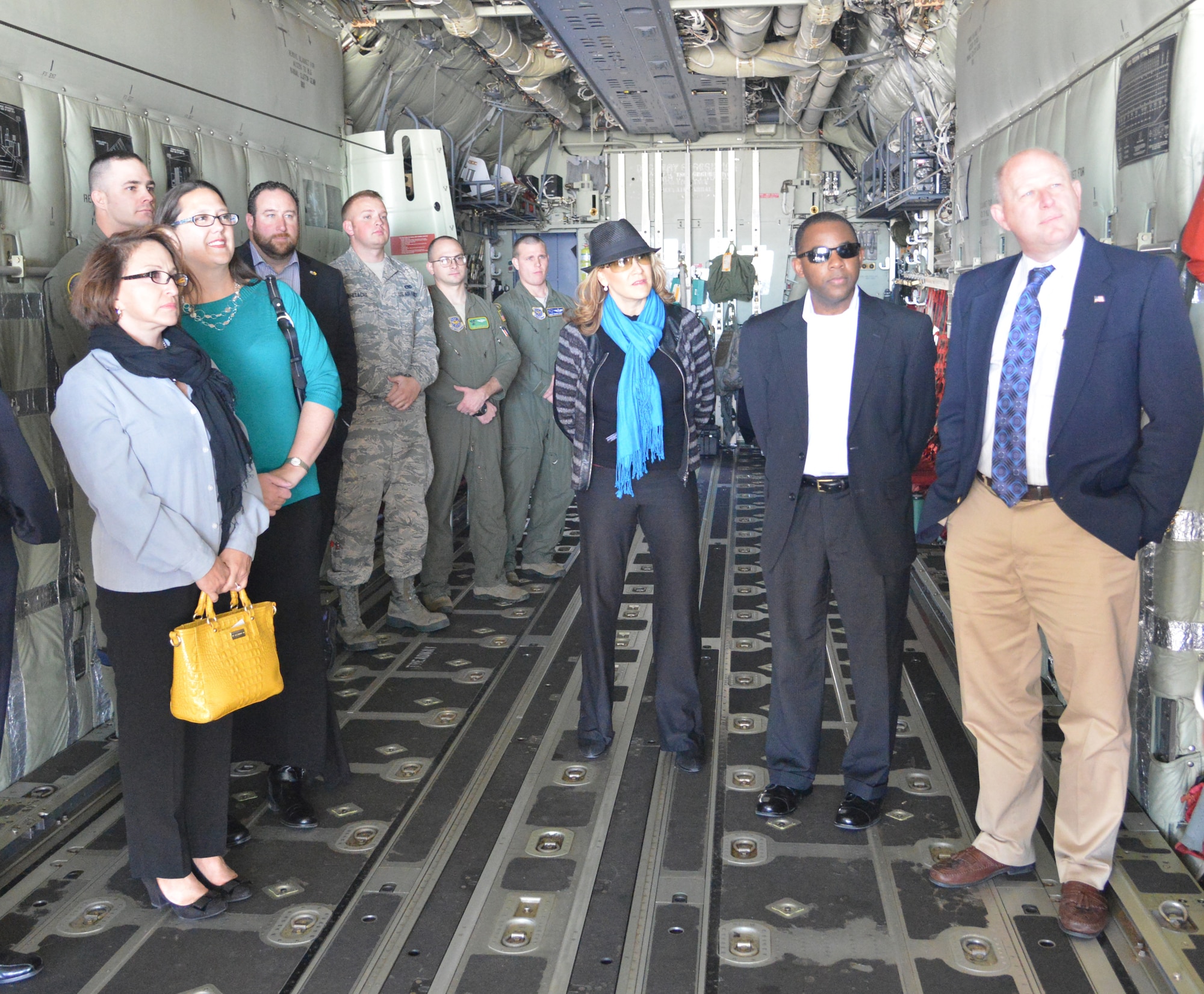 Kirtland Honorary Commanders Program participants tour a C-130 model trainer in the 58th SOW Monster Garage with Airmen Nov. 10. The Air Force program pairs local civic leaders with commanders and directors on the military installation in an effort to foster understanding between the military and civilian communities. (Photo by Todd Berenger)