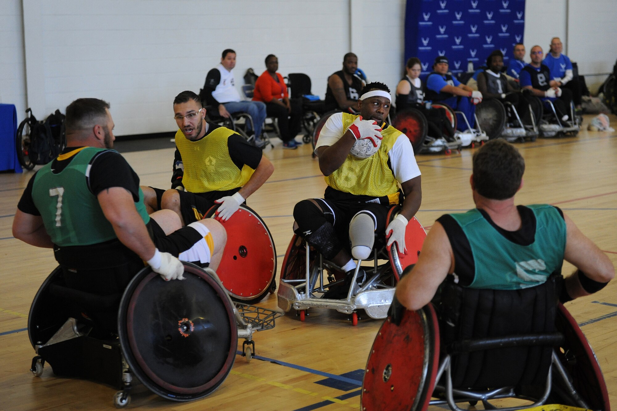 Retired Army Staff Sgt. Alexander Shaw makes his way downcourt during the Warrior CARE Month’s Joint Services Wheelchair Rugby Exhibition at Joint Base Andrews, Md., Nov. 16, 2015. (Defense Department photo/Marvin Lynchard)