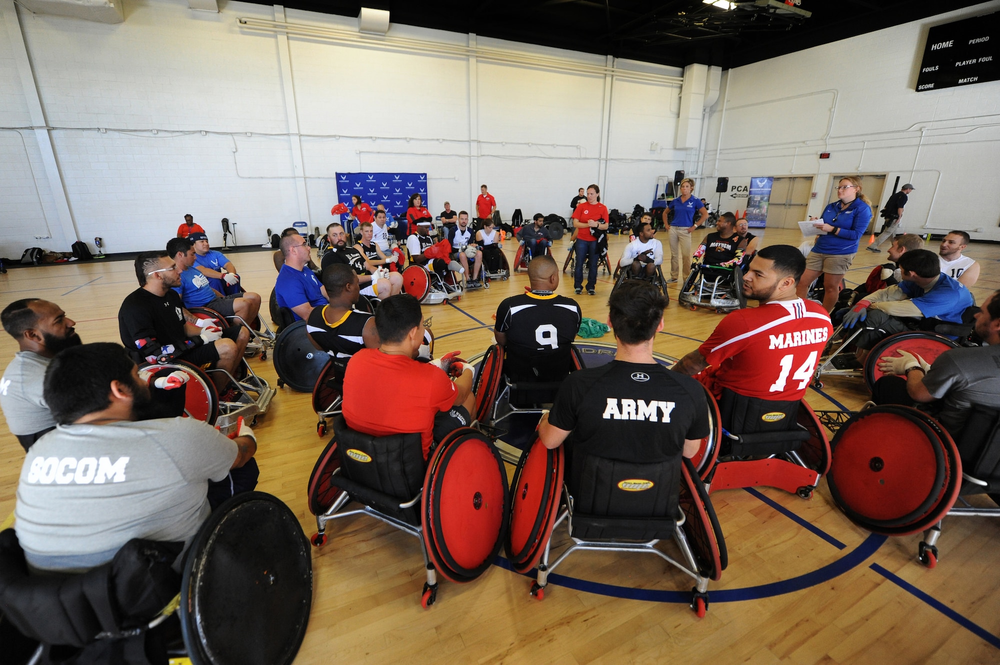 Wounded warriors from all branches of the armed forces participate in the Warrior CARE Month’s Joint Services Wheelchair Rugby Exhibition at Joint Base Andrews, Md., Nov. 16, 2015. (Defense Department photo/Marvin Lynchard)