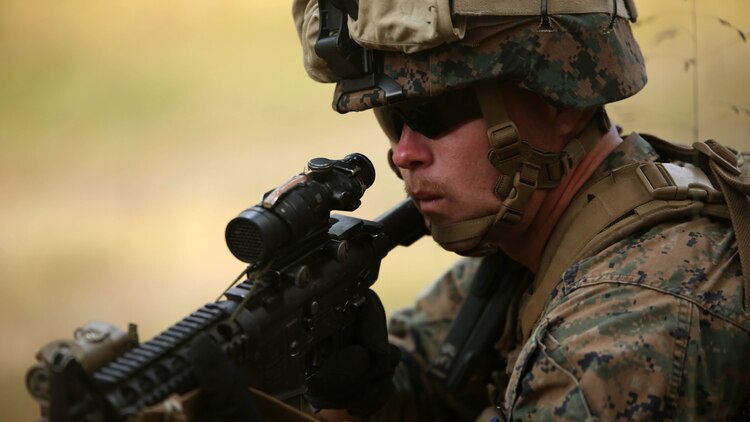 A Marine with Combined Anti-Armor Team, 3rd Battalion, 2nd Marine Regiment, provides security during a patrol training exercise at Marine Corps Base Camp Lejeune, North Carolina, Nov. 16, 2015. The unit practiced patrolling techniques both on foot and mounted in Humvees in preparation for their upcoming deployment to Okinawa, Japan. 