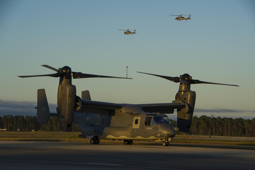 A CV-22B Osprey taxis across the flightline during Col. Ted Corallo’s“fini flight” at Hurlburt Field, Fla., Nov. 10, 2015. Corallo logged more than 3,600 flight hours in his career, and has served as the Air Force Special Operations Command chief of staff for the last 18 months.  (U.S. Air Force photo by Senior Airman Christopher Callaway) 