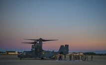 Air Commandos, friends and family gather around a CV-22B Osprey after Col. Ted Corallo’s “fini flight” at Hurlburt Field, Fla., Nov. 10, 2015. In his career, Corallo piloted 10 different aircraft platforms including the Cessna T-37, MC-130H Combat Talon II, and the Osprey. He recently served as the Air Force Special Operations Command chief of staff. (U.S. Air Force photo by Senior Airman Christopher Callaway)