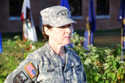 Maj. Gen. Margaret W. Boor, commanding general of the 99th Regional Support Command, waits for Lt. Gen. Jeffrey Talley, Chief of Army Reserve and Commanding General USARC, to arrive for a Commander's Huddle Nov. 18 at the 99th RSC's Command Headquarters.  The huddle was designed to enhance working relationships among Army Reserve Senior Commanders and Lt. Gen. Talley.