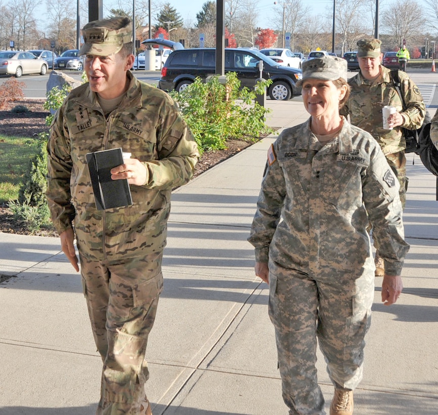 Maj. Gen. Margaret W. Boor, commanding general of the 99th Regional Support Command, walks with Lt. Gen. Jeffrey Talley, Chief of Army Reserve and Commanding General USARC, after he arrived for a Commander's Huddle Nov. 18 at the 99th RSC's Command Headquarters.  The huddle was an opportunity for Lt. Gen. Talley to update his commanders on key command priorities and issues and receive feedback from the field.