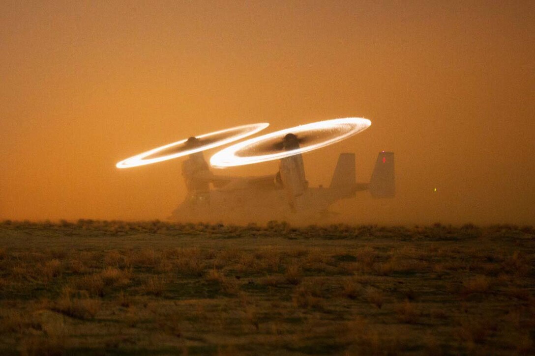 A U.S. Marine Corps MV-22 Osprey stages on a hasty landing zone during a drill at an undisclosed location in Southwest Asia, Nov. 16, 2015. Marines participating in the drill are assigned to Special Purpose Marine Air-Ground Task Force-Crisis Response-Central Command. U.S. Marine Corps photo by Lance Cpl. Clarence Leake