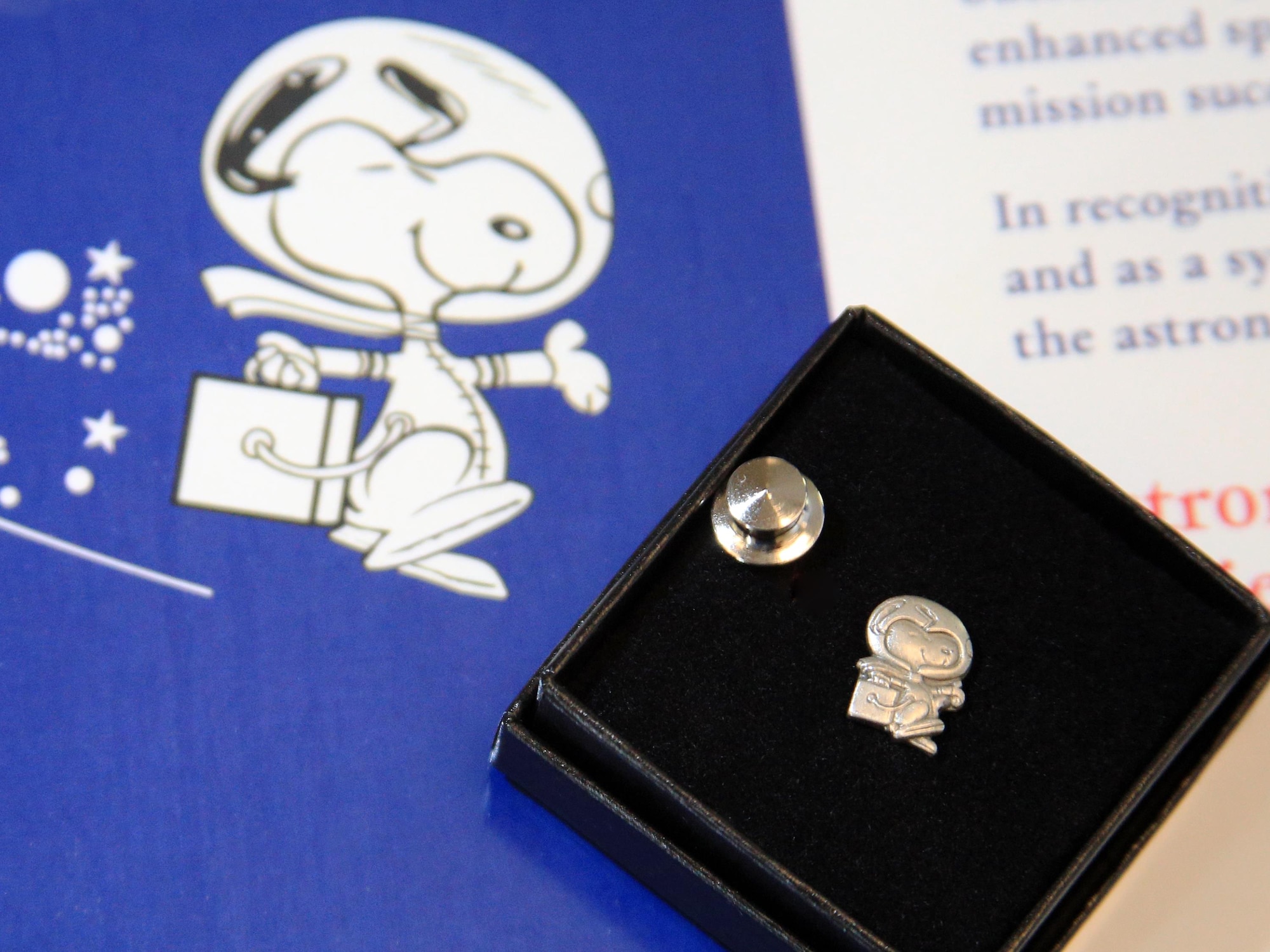 The Silver Snoopy Award was presented to Matthew Wright, a NASIC employee, by Col. Robert Behnken, a NASA astronaut, in a ceremony Tuesday, Nov. 17, 2015, at the National Air and Space Intelligence Center. (Photo courtesy of NASA)