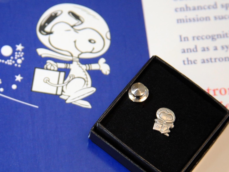 The Silver Snoopy Award was presented to Matthew Wright, a NASIC employee, by Col. Robert Behnken, a NASA astronaut, in a ceremony Tuesday, Nov. 17, 2015, at the National Air and Space Intelligence Center. (Photo courtesy of NASA)