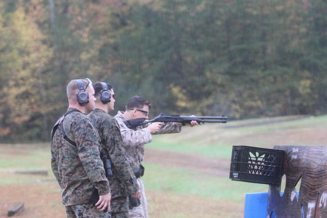 Marines participate in the fifth annual Combat Shooting Competition Oct. 28, hosted by Weapons Training Battalion aboard Marine Corps Base Quantico.  The weeklong tournament challenged Marines in the application of basic fundamentals of marksmanship in a simulated combat environment. Infantrymen competed against Marines from Quantico, Marine Corps Air Station New River and Marine Corps Base Camp Lejeune participated in the competition.