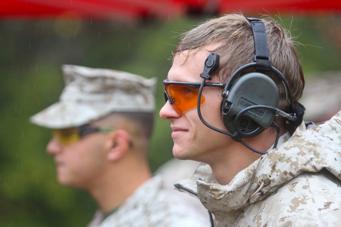 Cpl. David Dudley, Marine Corps Air Station New River, N.C., uses proper eye and ear protection during the fifth annual Combat Shooting Competition Oct. 28, hosted by Weapons Training Battalion aboard Marine Corps Base Quantico.