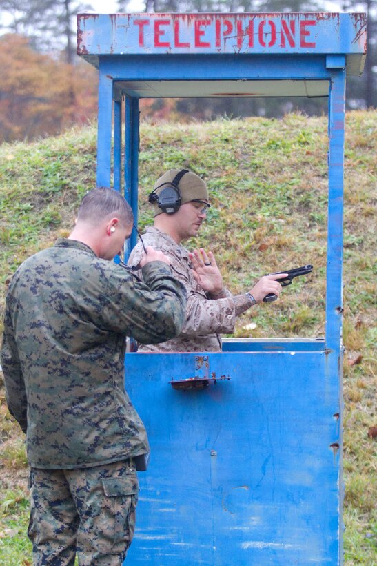 Marines participate in the fifth annual Combat Shooting Competition Oct. 28, hosted by Weapons Training Battalion aboard Marine Corps Base Quantico. The weeklong tournament challenged Marines in the application of basic fundamentals of marksmanship in a simulated combat environment. Infantrymen competed against Marines from Quantico, Marine Corps Air Station New River and Marine Corps Base Camp Lejeune participated in the competition.