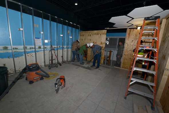 Contractors work on the enlisted dormitories dayroom at Laughlin Air Force Base, Texas, Nov. 19, 2015. The renovation project took nearly six months to plan and is scheduled to be completed by the end of January 2016. (U.S. Air Force photo by Airman 1st Class Ariel D. Partlow)