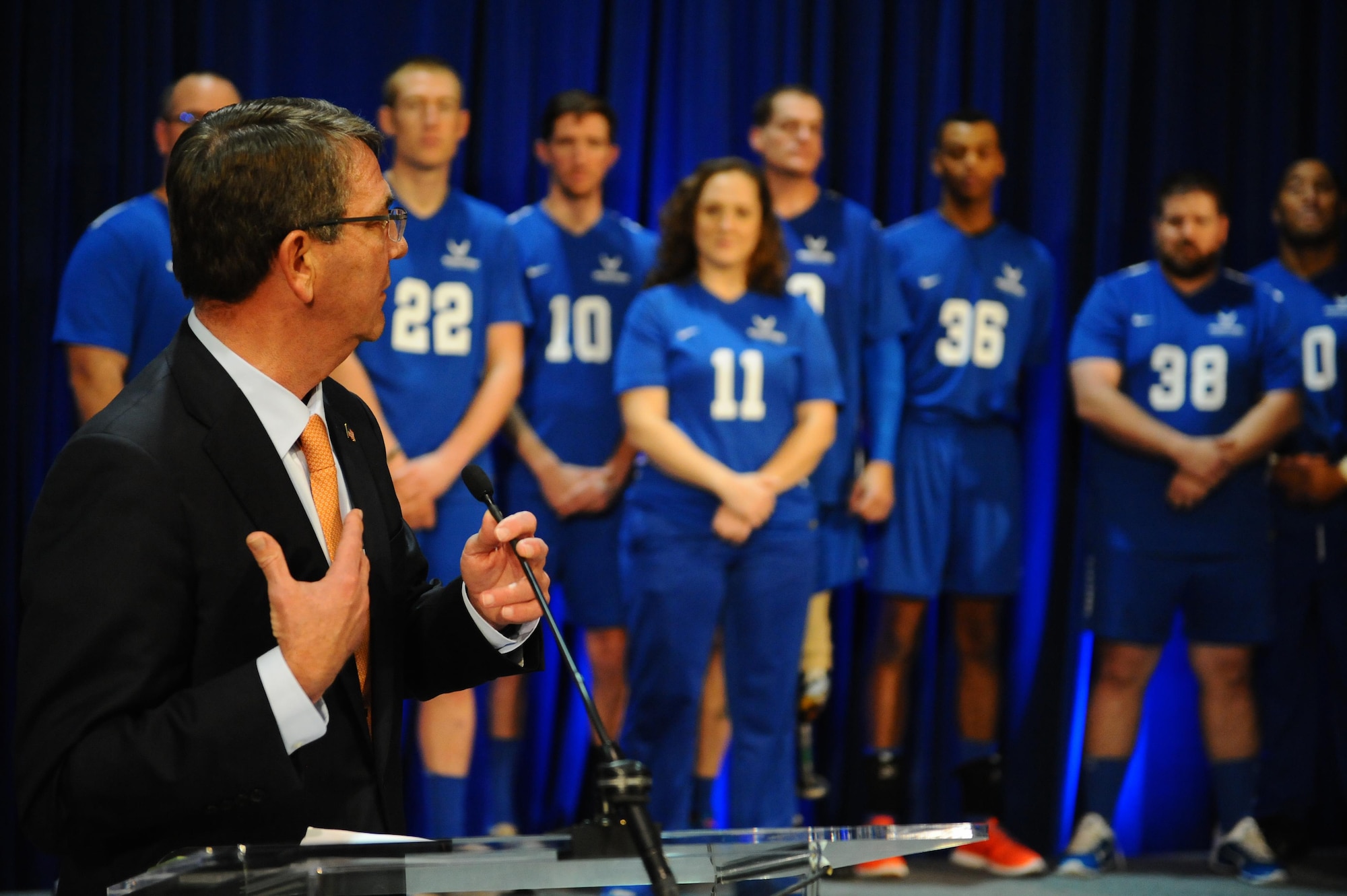 Defense Secretary Ash Carter speaks to a crowd of fans at the trophy presentation during the Warrior Care Month Sitting Volleyball Tournament at the Pentagon in Washington D.C., Nov. 19, 2015. The Air Force team edged out the Marines in the final match. (U.S. Air Force photo/Senior Airman Hailey Haux)