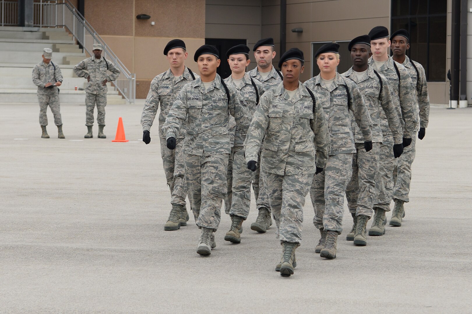 A drill team composed of students from the 937th Training Group competes in a drill competition against 344th Training Squadron and 343th TRS Nov. 13, 2015, at Joint Base San Antonio-Lackland, Texas. (U.S. Air Force photo by Senior Airman Krystal Wright/Released)