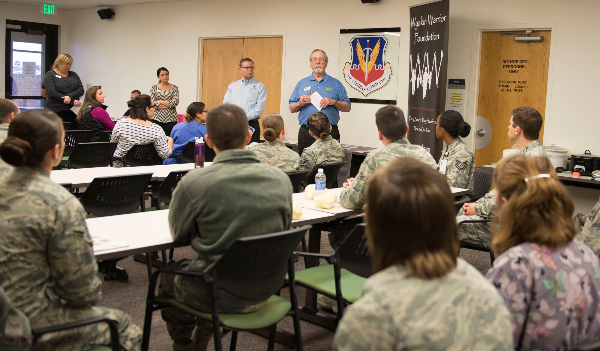 Retired Army Chief Warrant Office 3 Clifford Gaston, Wyakin Warrior Foundation senior development advisor, speaks to Department of Defense employees during a Combined Federal Campaign Charity Fair Nov. 17, 2015, at Mountain Home Air Force Base, Idaho. The CFC is known to be the most inclusive workplace giving campaign in the world with over 20,000 participating nonprofit charitable organizations worldwide. (U.S. Air Force photo by Airman Chester Mientkiewicz)