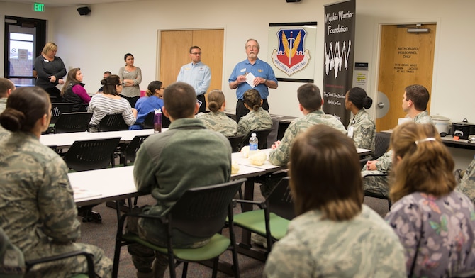 Retired Army Chief Warrant Office 3 Clifford Gaston, Wyakin Warrior Foundation senior development advisor, speaks to Department of Defense employees during a Combined Federal Campaign Charity Fair Nov. 17, 2015, at Mountain Home Air Force Base, Idaho. The CFC is known to be the most inclusive workplace giving campaign in the world with over 20,000 participating nonprofit charitable organizations worldwide. (U.S. Air Force photo by Airman Chester Mientkiewicz)