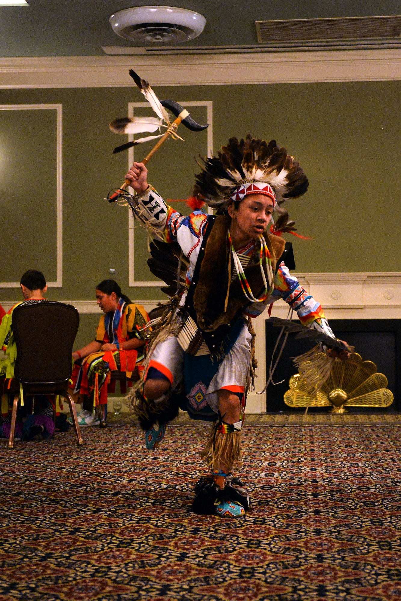 Izzy Tamayo performs the Men’s Northern Traditional dance, a warrior’s dance, Nov. 18, 2015, during the Native American Heritage Month Cultural Information Fair and Expo at the Patriot Club, Offutt Air Force Base, Neb. Tamayo makes a lot of his tradition clothing by hand. (U.S. Air Force photo by Josh Plueger)