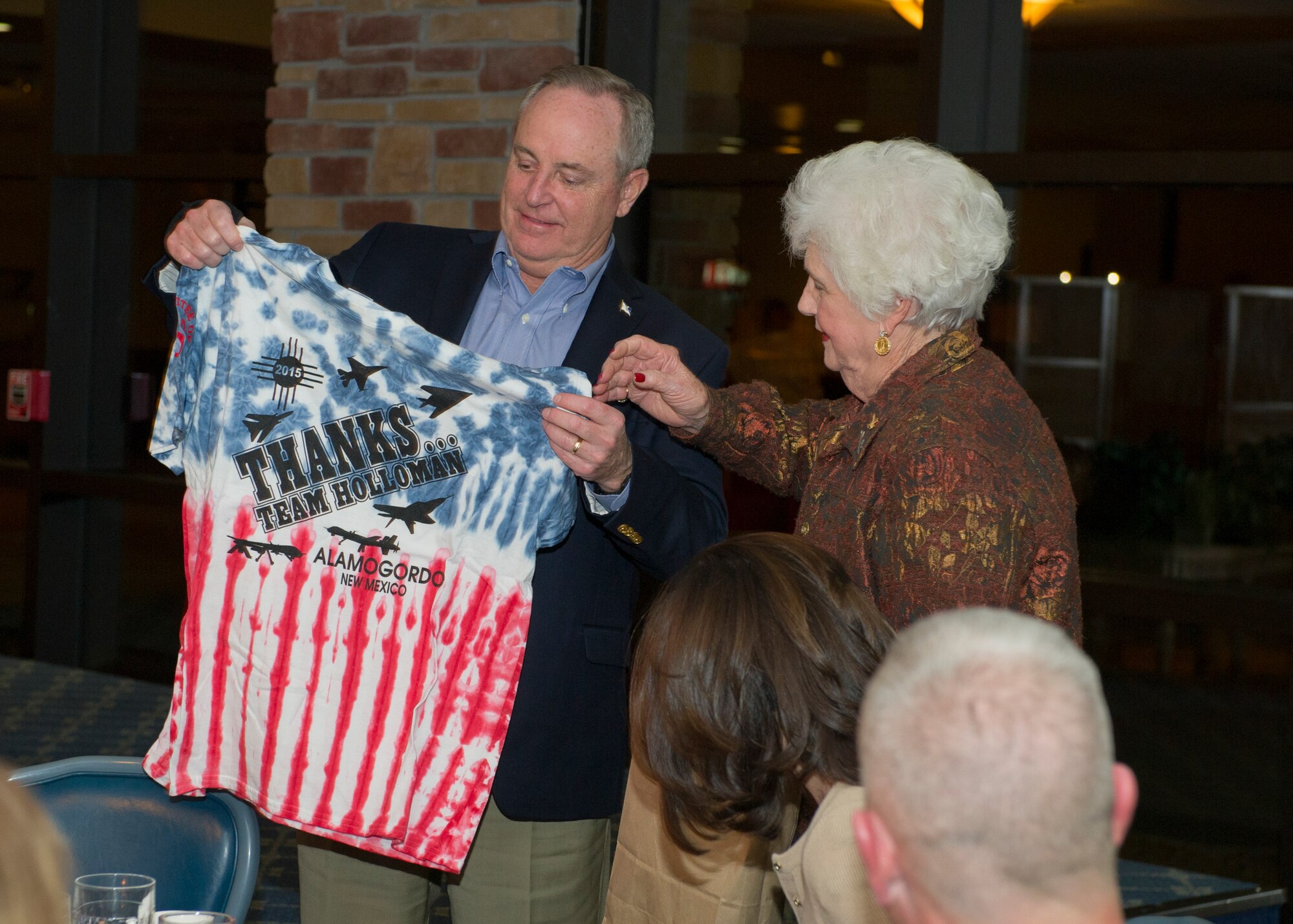 Air Force Chief of Staff Gen. Mark A. Welsh lll receives a gift from Toots Green, a Holloman Wingman, to thank him for taking the time to visit Holloman Air Force Base, New Mexico on Nov. 16th. Welsh accepted the gift as part of a civic leader dinner to get to know the leaders of the community and learn how their support helps Team Holloman and its mission every day. He also had the opportunity to tour Holloman and review Air Force needs, requirements and investments with a sustained focus on successes and challenges Airmen face today. Welsh was joined by his wife, Betty Welsh, who addressed top Air Force issues such as suicide prevention, resiliency, exceptional family member programs and sexual assault. (U.S. Air Force photo by Senior Airman Leah Ferrante)