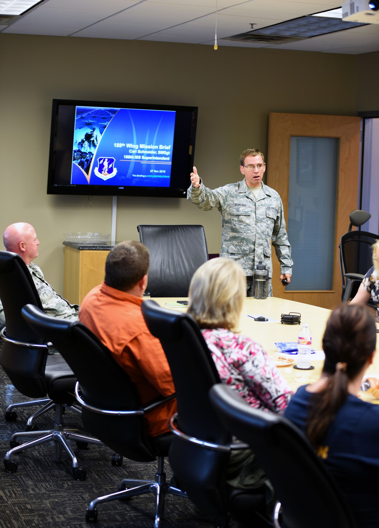 Senior Master Sgt. Carl Schneider, 188th Intelligence Support Squadron superintendent, advises Airman and their families Nov. 7, 2015, on the wing’s new mission sets and provided tips for their physical and mental health at Ebbing Air National Guard Base, Fort Smith, Ark. Schneider said that new missions can increase stress as well as leave many open questions for families, especially those concerning the MQ-9 Reapers that will soon provide intelligence, surveillance and reconnaissance with a re-designated attack squadron. (U.S. Air National Guard photo by Senior Airman Cody Martin/Released)
