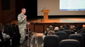 Col. Robert Lyman, Joint Base Charleston commander, speaks during a commander's call Nov. 20, 2015, at the base theater on JB Charleston -- Air Base, S.C. Lyman talked with Airmen about the importance of suicide awareness and how it impacts us around the workplace and at home. (U.S. Air Force photo/Airman 1st Class Clayton Cupit)
