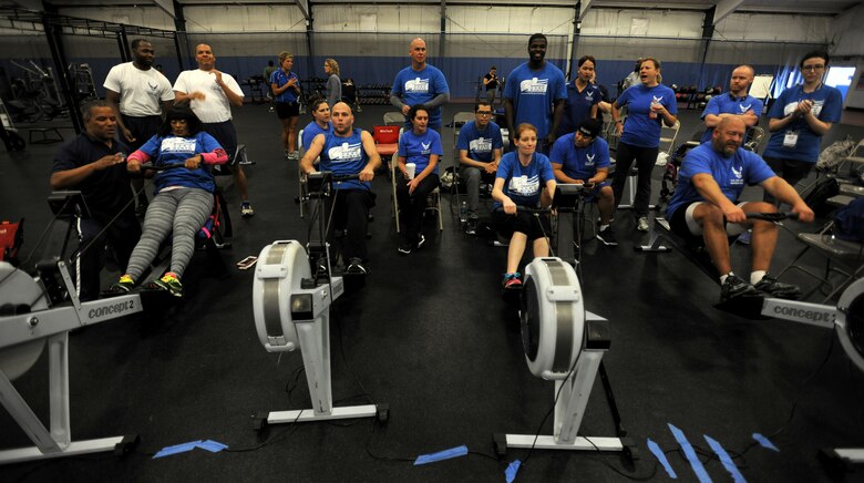 Wounded, ill or injured warriors race on rowing machines during the Northeast Region Warrior CARE Event at Joint Base Andrews, Md., Nov. 18. The event is in conjunction with Warrior Care Month, a month dedicated to honoring the courage, resilience and accomplishments of wounded, ill and injured service members, their families and their caregivers. (U.S. Air Force Photo/Tech. Sgt. Brian Ferguson)
