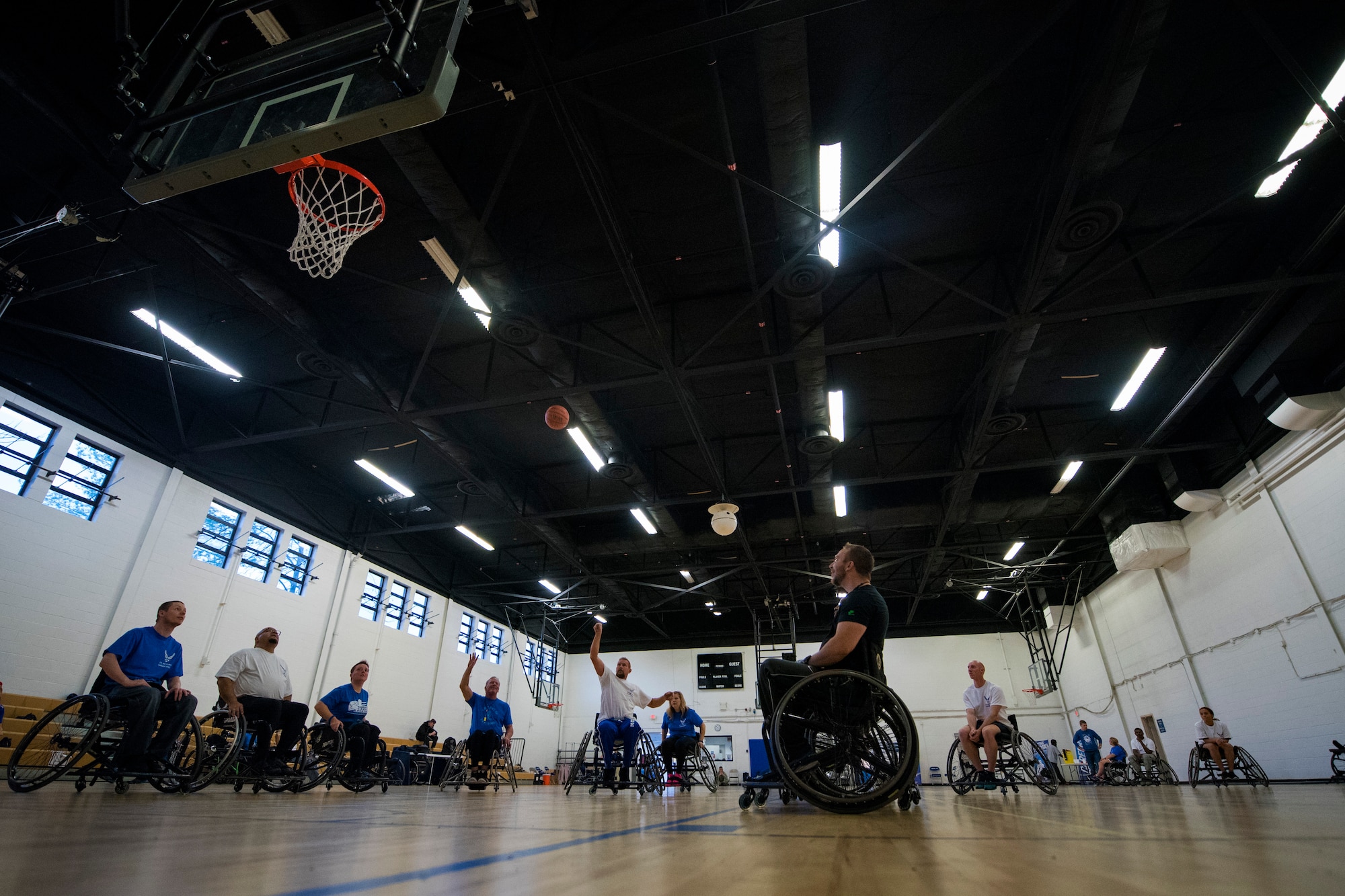 Scott Addington, retired U.S. Air Force member, shoots a free throw during a wheelchair basketball game at Joint Base Andrews, Md., Nov. 18, 2015. The game is part of a weeklong Northeast Region Warrior CARE Event in conjunction with Warrior Care Month, dedicated to honoring wounded, ill and injured service members, their families and their caregivers. (U.S. Air Force photo/Airman 1st Class Philip Bryant)