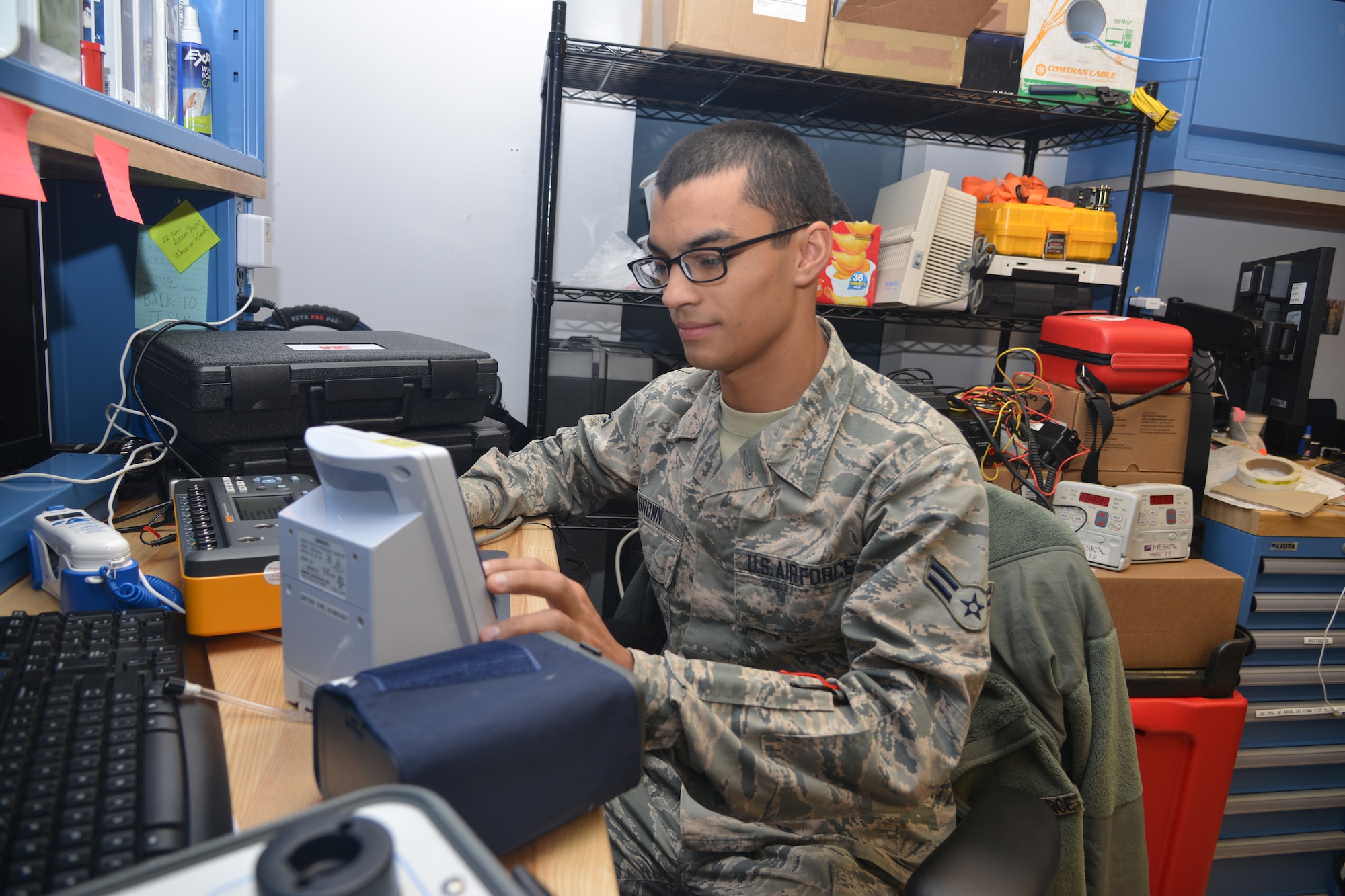Airman 1st Class Drew Brown, a biomedical equipment technician from the 377th Medical Support Squadron, maintains a $4.4 million medical equipment maintenance account.  He was selected by leadership for the Kirtland Warrior honors. (Photo by Todd Berenger)