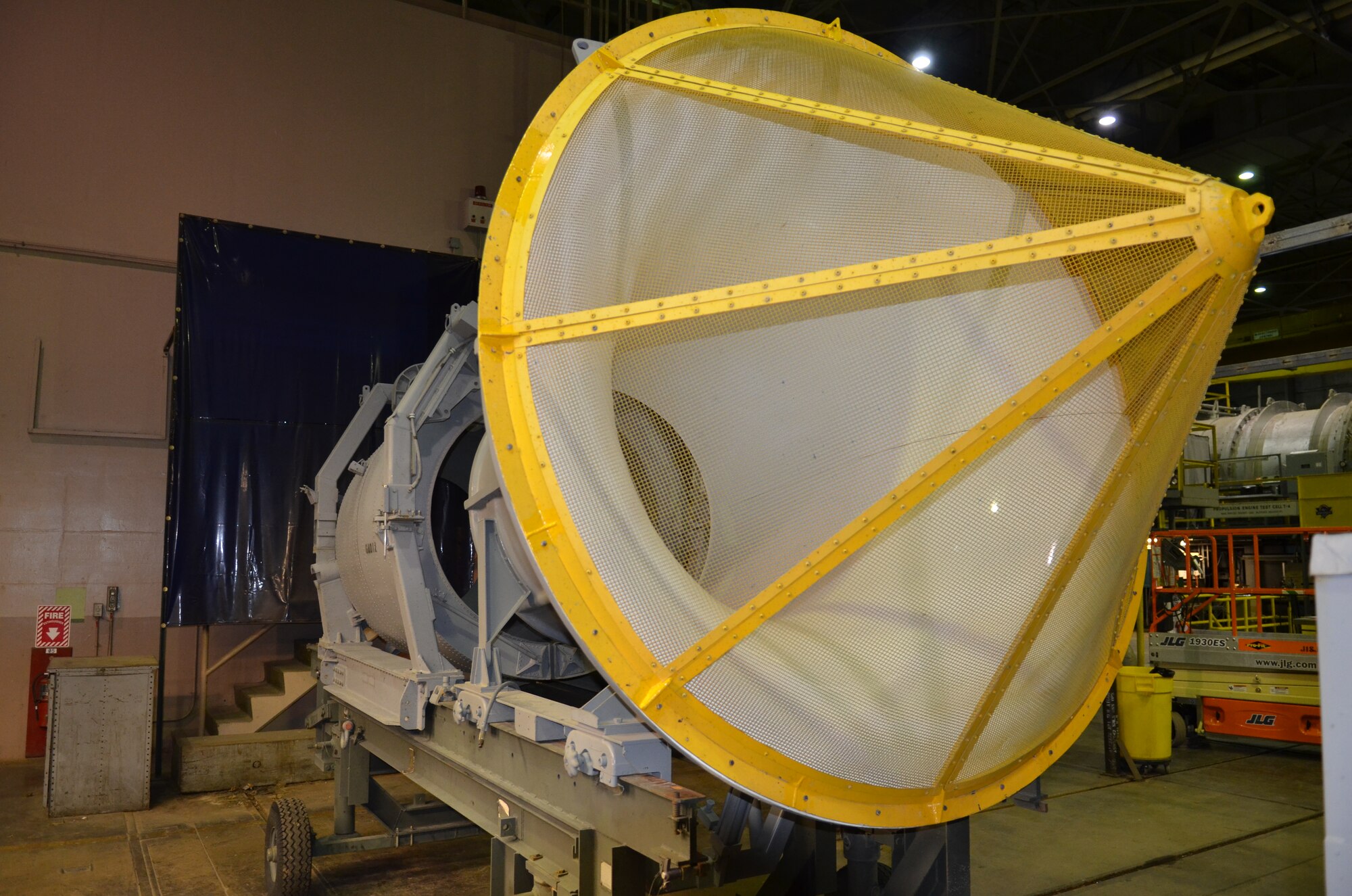 A team of engineers at AEDC performed the reverse engineering of a TF34 50-10000 Quick Engine Change kit for the Air Force Life Cycle Management Center. This picture shows a yellow screen covering the bellmouth of the kit, which is meant to help protect the engine from foreign object damage. (Photo provided)