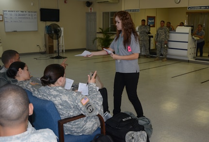 Joint Security Forces members from Soto Cano Air Base, Honduras, process through customs before returning to Puerto Rico, Nov. 19, 2015, after completing their deployment in Honduras. The JSF members were stationed in Honduras for nine months before swapping out with a new unit. (U.S. Air Force photo by Martin Chahin/Released)