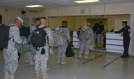 Joint Security Forces members from Soto Cano Air Base, Honduras, prepare to re-deploy to Puerto Rico, Nov. 19, 2015, after completing their deployment in Honduras. The JSF members were stationed in Honduras for nine months before swapping out with a new unit. (U.S. Air Force photo by Martin Chahin/Released)