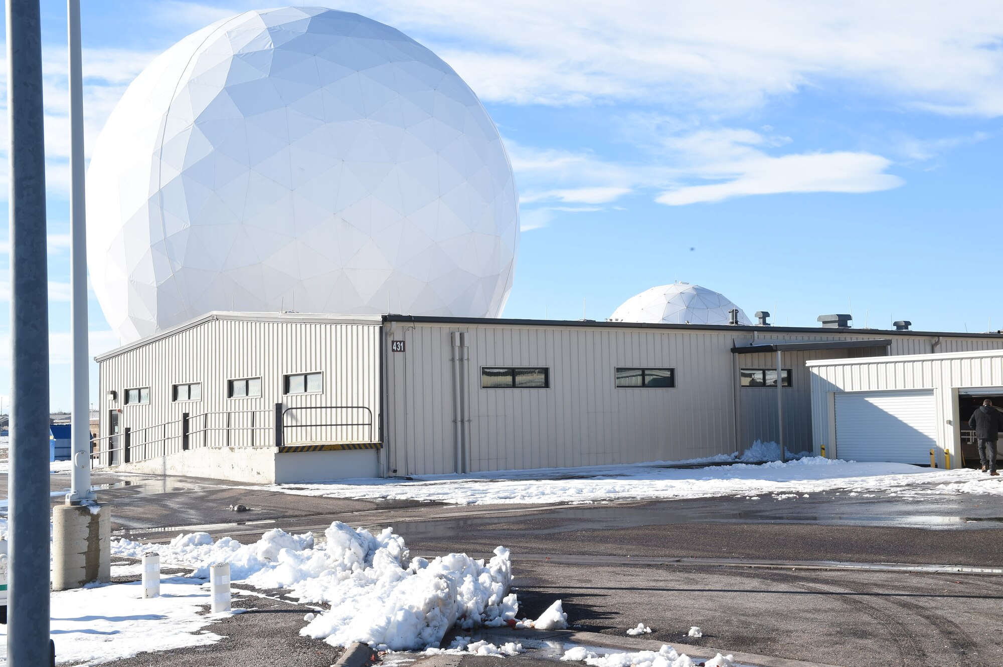 The roof of Bldg. 431 in the restricted area is unable to bear the weight of more than six inches of snow at a time, Nov. 18, 2015, on Buckley Air Force Base, Colo. Currently, occupants of Bldg. 431 and 429 must evacuate the buildings and find alternate duty locations when it snows. A proposal is in place to demolish these buildings and build the SBIRS Operations Facility, which is set to consolidate the work centers and offer permanent homes to the nearly 200 people who work in the existing facilities. (U.S. Air Force photo by Airman 1st Class Samantha Meadors/Released)