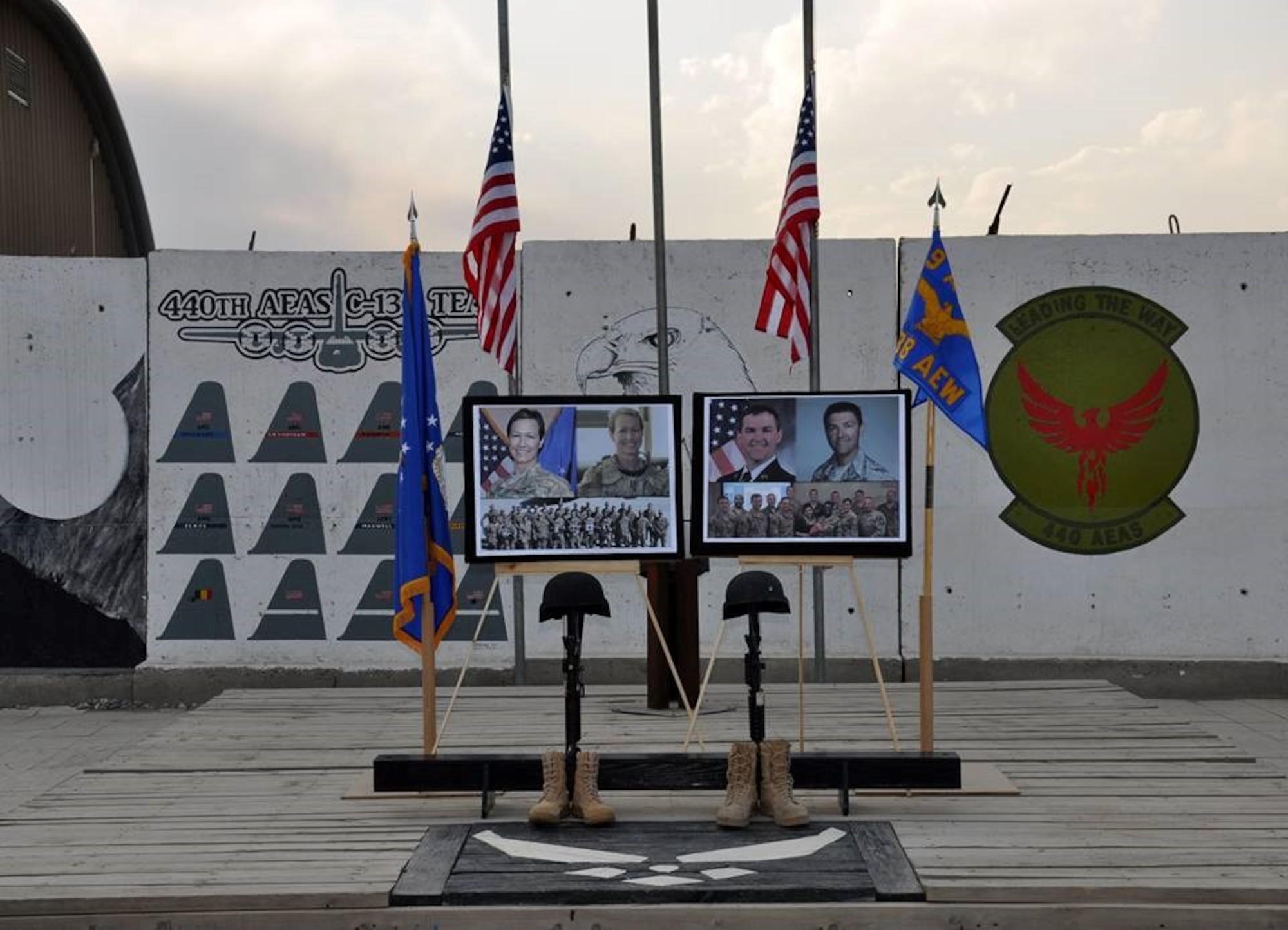 Train, Advise, Assist Command-Air (TAAC-Air) personnel hold a sunset memorial service for Maj. Phyllis Pelky and Master Sgt. Greg Kuhse, Oct. 14, 2015, at Forward Operating Base Oqab, Kabul, Afghanistan. Pelky and Kuhse died in a helicopter crash in Kabul Oct. 11, 2015. (U.S. Air Force courtesy photo/released)