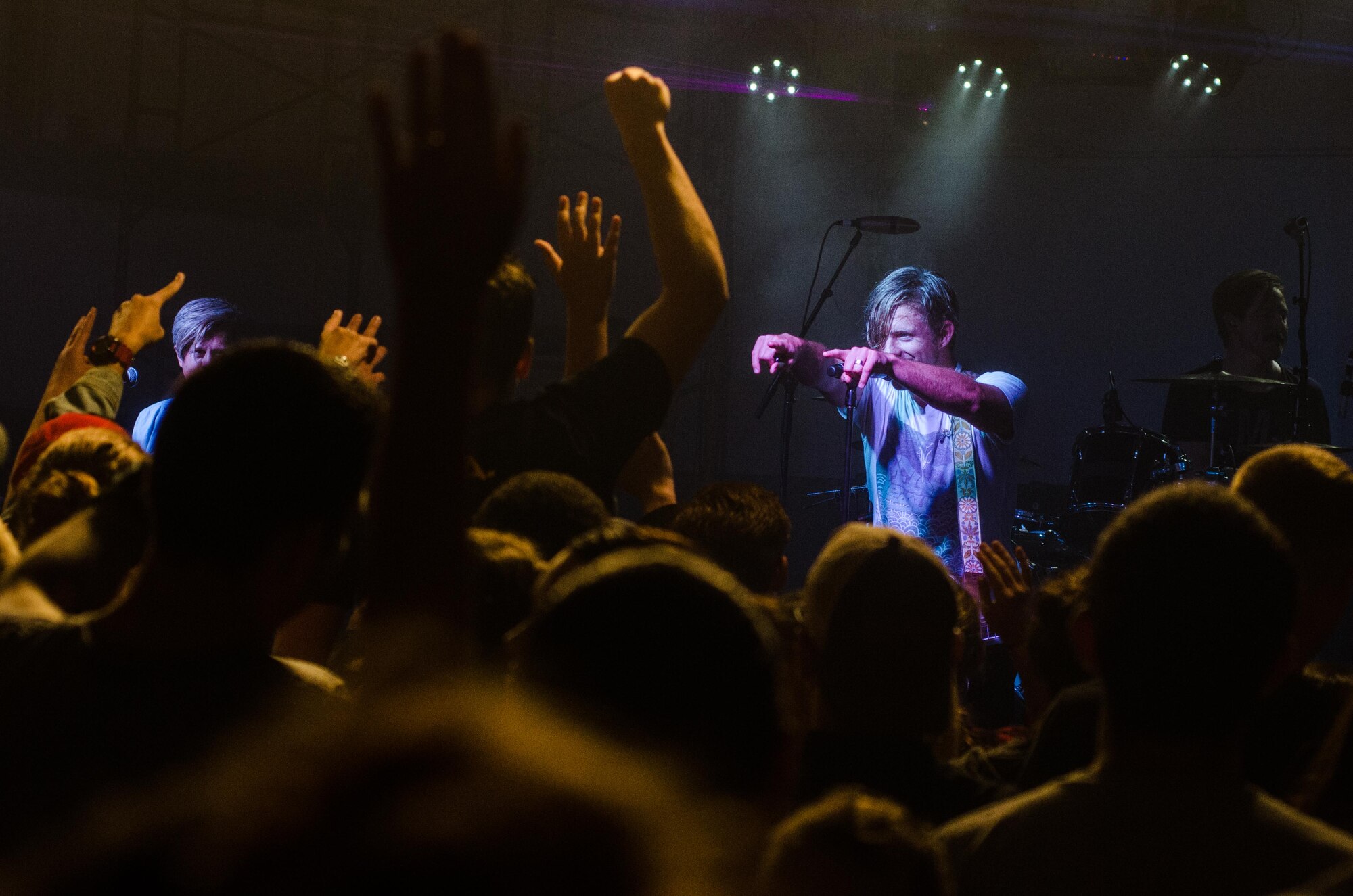 Switchfoot frontman Jon Foreman interacts with his audience Nov. 21, 2015, at Andersen Air Force Base, Guam. The alternative rock band performed two free concerts for service members and families assigned to the island. (U.S. Air Force photo by Staff Sgt. Alexander W. Riedel/Released)