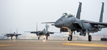 Republic of Korea air force F-15K Slam Eagles from the 11th Fighter Wing, Daegu, taxi on the runway during Buddy Wing 15-7 at Kunsan Air Base, Republic of Korea, Nov. 17, 2015. Wolf Pack Airmen trained alongside Airmen of the 11th Fighter Wing, learning how to operate as one force with dissimilar fighter aircraft. (U.S. Air Force photo by Staff Sgt. Nick Wilson/Released)