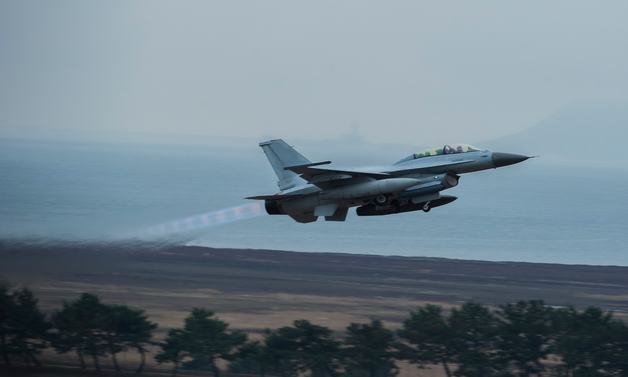 A Republic of Korea air force KF-16 Fighting Falcon from the 38th Fighter Wing takes off as part of Buddy Wing 15-7 at Kunsan Air Base, ROK, Nov. 19, 2015. Buddy Wing is part of a combined fighter exchange program designed to improve interoperability between U.S. Air Force and ROKAF fighter squadrons and are conducted multiple times throughout the year in order to promote cultural awareness and sharpen combined combat capabilities. (U.S. Air Force photo by Staff Sgt. Nick Wilson/Released)