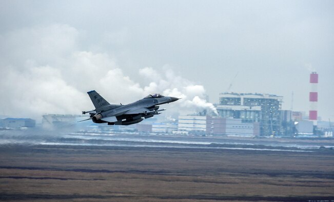 An F-16 Fighting Falcon from the 8th Fighter Wing takes off as part of Buddy Wing 15-7 at Kunsan Air Base, Republic of Korea, Nov. 19, 2015. Buddy Wing is part of a combined fighter exchange program designed to improve interoperability between U.S. Air Force and ROKAF fighter squadrons and are conducted multiple times throughout the year in order to promote cultural awareness and sharpen combined combat capabilities. (U.S. Air Force photo by Staff Sgt. Nick Wilson/Released)