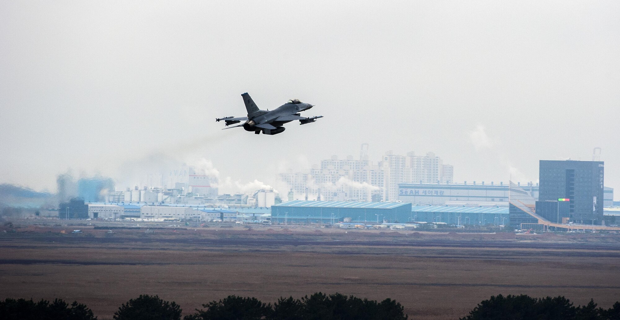 An F-16 Fighting Falcon from the 8th Fighter Wing takes off as part of Buddy Wing 15-7 at Kunsan Air Base, Republic of Korea, Nov. 19, 2015. Buddy Wing is part of a combined fighter exchange program designed to improve interoperability between U.S. Air Force and ROKAF fighter squadrons and are conducted multiple times throughout the year in order to promote cultural awareness and sharpen combined combat capabilities. (U.S. Air Force photo by Staff Sgt. Nick Wilson/Released)