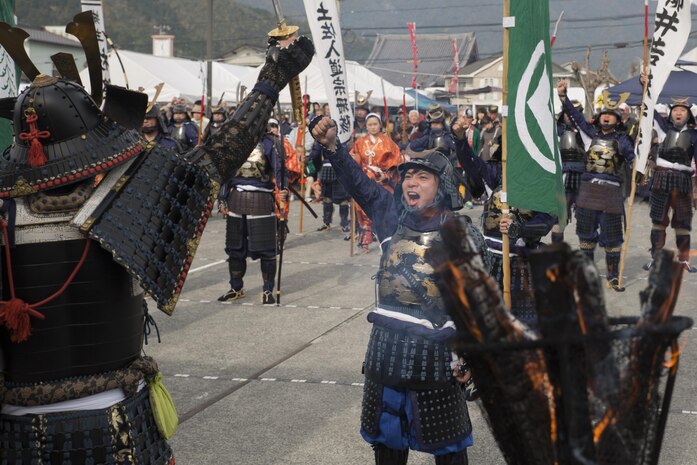 Participants give one last war cry before marching off at the Kuragake Castle Festival in Kuga, Iwakuni, Japan, Nov. 22, 2015. The festival honors the local Kuga samurai who urged their castle lord to take a last stand against a much larger enemy force. According to event coordinators, U.S. participants in the 26th annual Kuragake Castle Festival boosted the spirit of the festival and made the stage performance one of their most highlighted events.