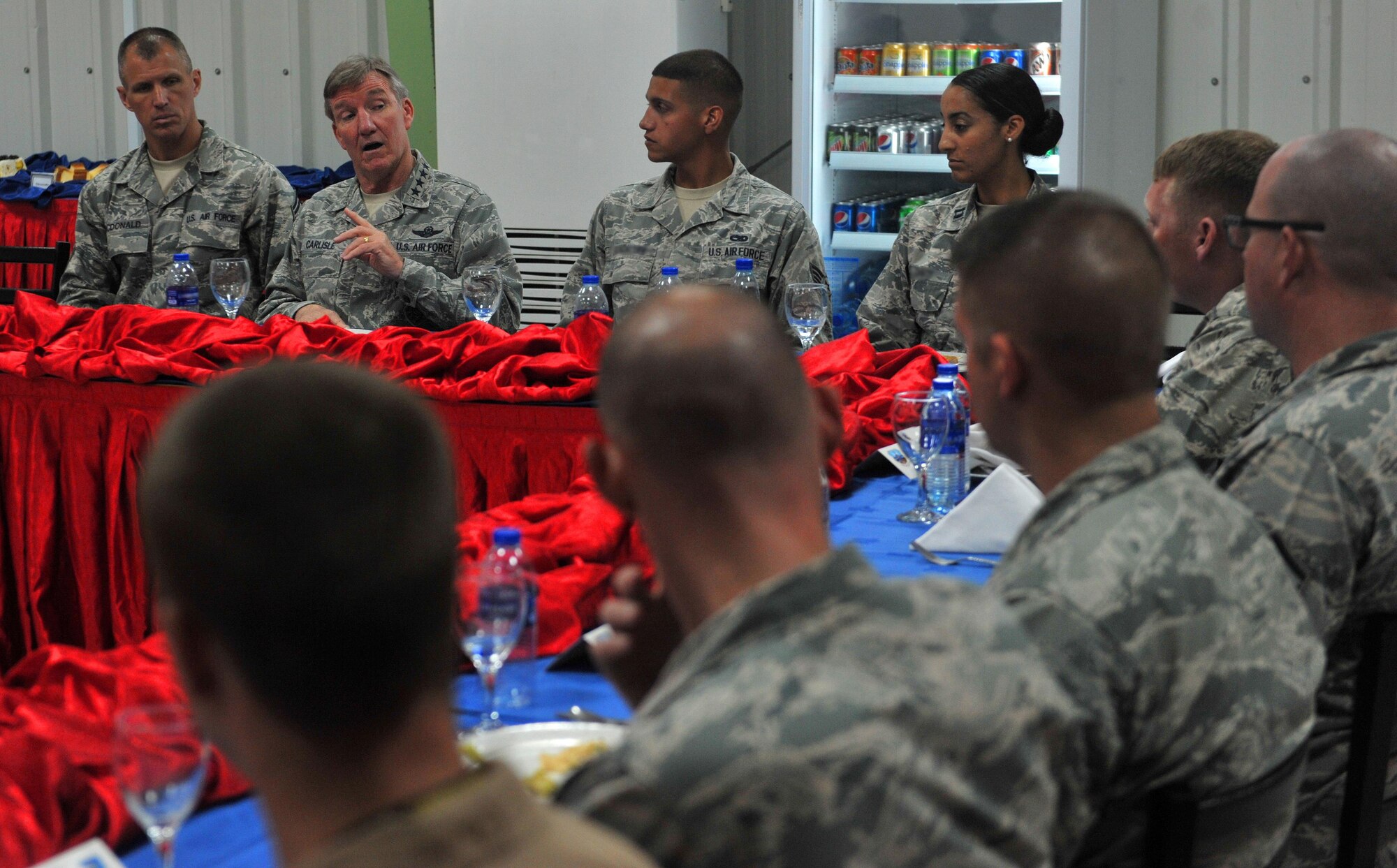 Gen. Hawk Carlisle, commander of Air Combatant Command, speaks to a group of 380th Air Expeditionary Wing Airmen during a luncheon, Oct. 19, 2015. Carlisle is responsible for organizing, training, equipping and maintaining combat ready forces in the form of more than 1,300 aircraft, 34 wings and 19 bases for rapid deployment and employment around the world, while ensuring strategic air defense forces are ready to meet challenges of peacetime air sovereignty and wartime defense.  (U.S. Air Force photo by Staff Sgt. Kentavist Brackin/Released) 