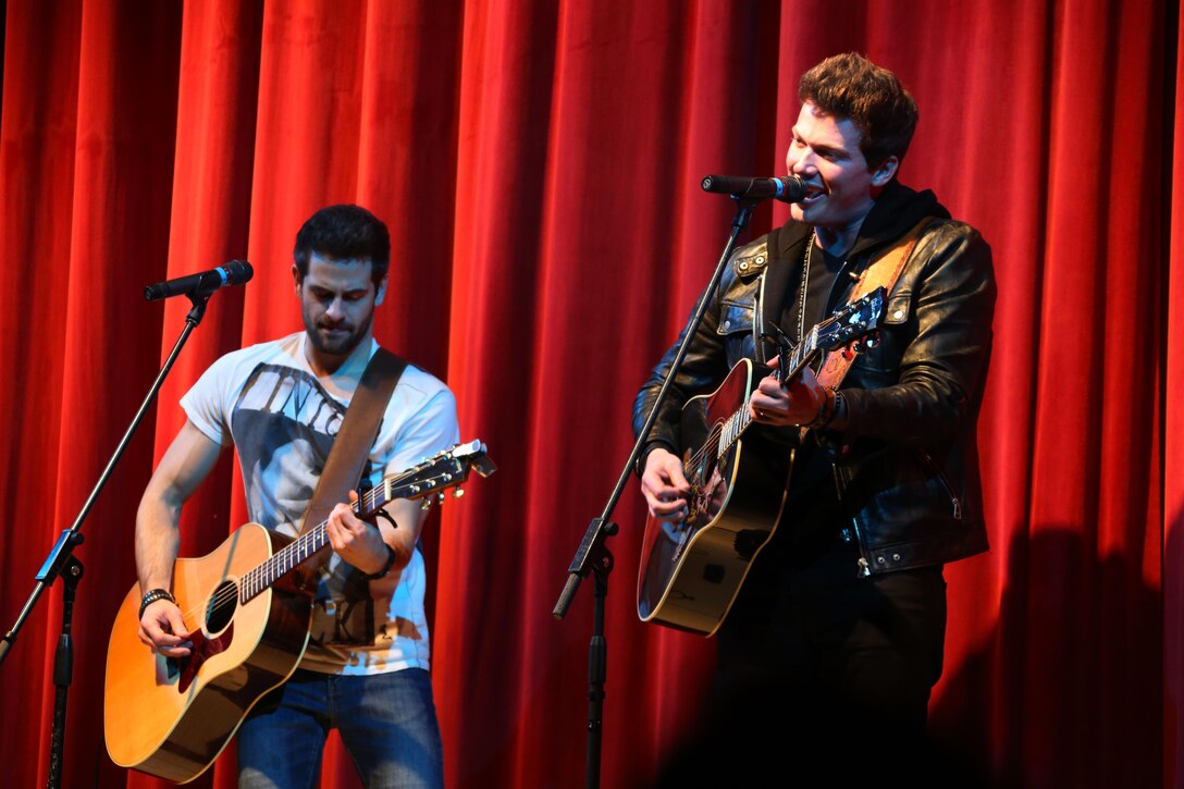 The band Waterloo Revival plays for a crowd of nearly 2,000 Marines, Sailors and community members during the 7th annual WRNS Guitar Pull at Marine Corps Air Station Cherry Point, N.C., Nov. 19, 2015. The free concert which was hosted by Marine Corps Community Services and local country music radio station WRNS. The guitar pull featured talents including William Michael Morgan, Cam, Canaan Smith, Cassadee Pope and Waterloo Revival.  (U.S. Marine Corps Photo By Cpl. N.W. Huertas/Released)