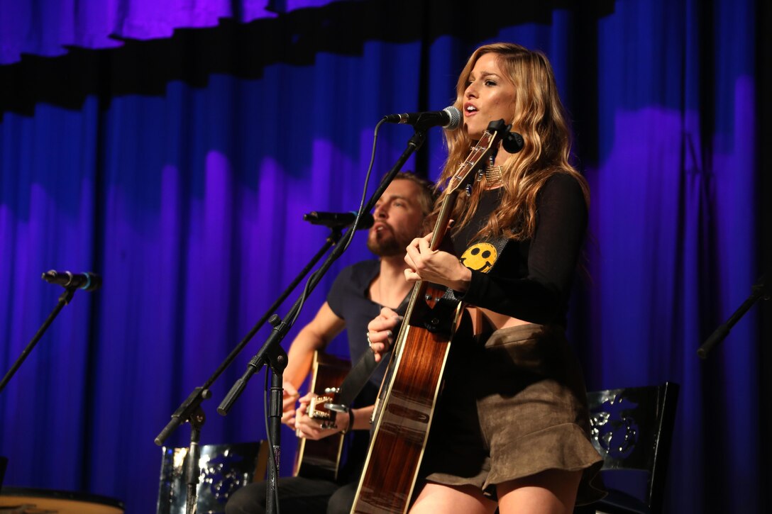 Country music singer Cassadee Pope performs for a crowd of nearly 2,000 Marines, Sailors and community members during the 7th annual WRNS Guitar Pull at Marine Corps Air Station Cherry Point, N.C., Nov. 19, 2015. The free concert which was hosted by Marine Corps Community Services and local country music radio station WRNS. The guitar pull featured talents including William Michael Morgan, Cam, Canaan Smith, Cassadee Pope and Waterloo Revival.  (U.S. Marine Corps Photo By Cpl. N.W. Huertas/Released)