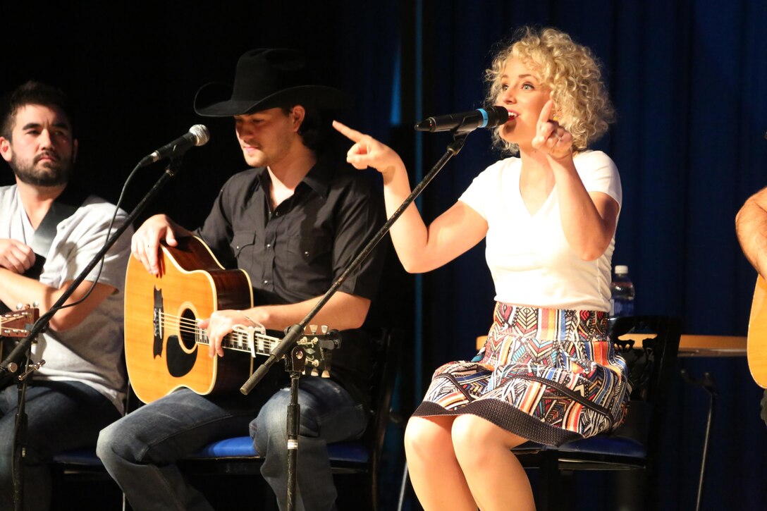 Country music singer Cam performs for a crowd of nearly 2,000 Marines, Sailors and community members during the 7th annual WRNS Guitar Pull at Marine Corps Air Station Cherry Point, N.C., Nov. 19, 2015. The free concert which was hosted by Marine Corps Community Services and local country music radio station WRNS. The guitar pull featured talents including William Michael Morgan, Cam, Canaan Smith, Cassadee Pope and Waterloo Revival.  (U.S. Marine Corps Photo By Cpl. N.W. Huertas/Released)