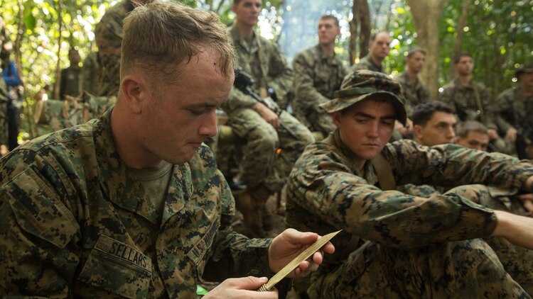 U.S. Marine Lance Cpl. Nicholas Sellars looks at a knife made of bamboo in a jungle survival course during Malaysia-United States Amphibious Exercise 2015. Sellars is a mortar man with Weapons Company, Battalion Landing Team 3rd Battalion, 1st Marine Regiment, 15th Marine Expeditionary Unit. During the course, Marines learned how to trap wild game, find sources of fresh water, build shelters, and how to start a fire from soldiers with the Malaysian armed forces. The purpose of the exercise was to strengthen military cooperation in the planning and execution of amphibious operations between Malaysian armed forces and U.S. Marines. The 15th MEU is currently deployed in the Indo-Asia-Pacific region to promote regional stability and security in the U.S. 7th Fleet area of operations. 