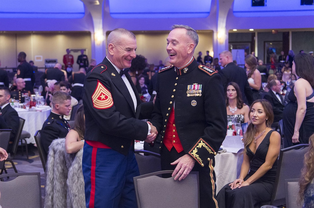 Marine Corps Gen. Joseph F. Dunford Jr., the chairman of the Joint Chiefs of Staff, speaks with Sgt. Maj. Bryan B. Battaglia, senior enlisted advisor to the chairman, at Marine Barracks Washington, D.C.'s 240th Marine Corps Birthday celebration Nov. 21, 2015, in Washington, D.C. Dunford was the guest of honor during the ceremony. (Department of Defense photo by Petty Officer 2nd Class Dominique A. Pineiro)